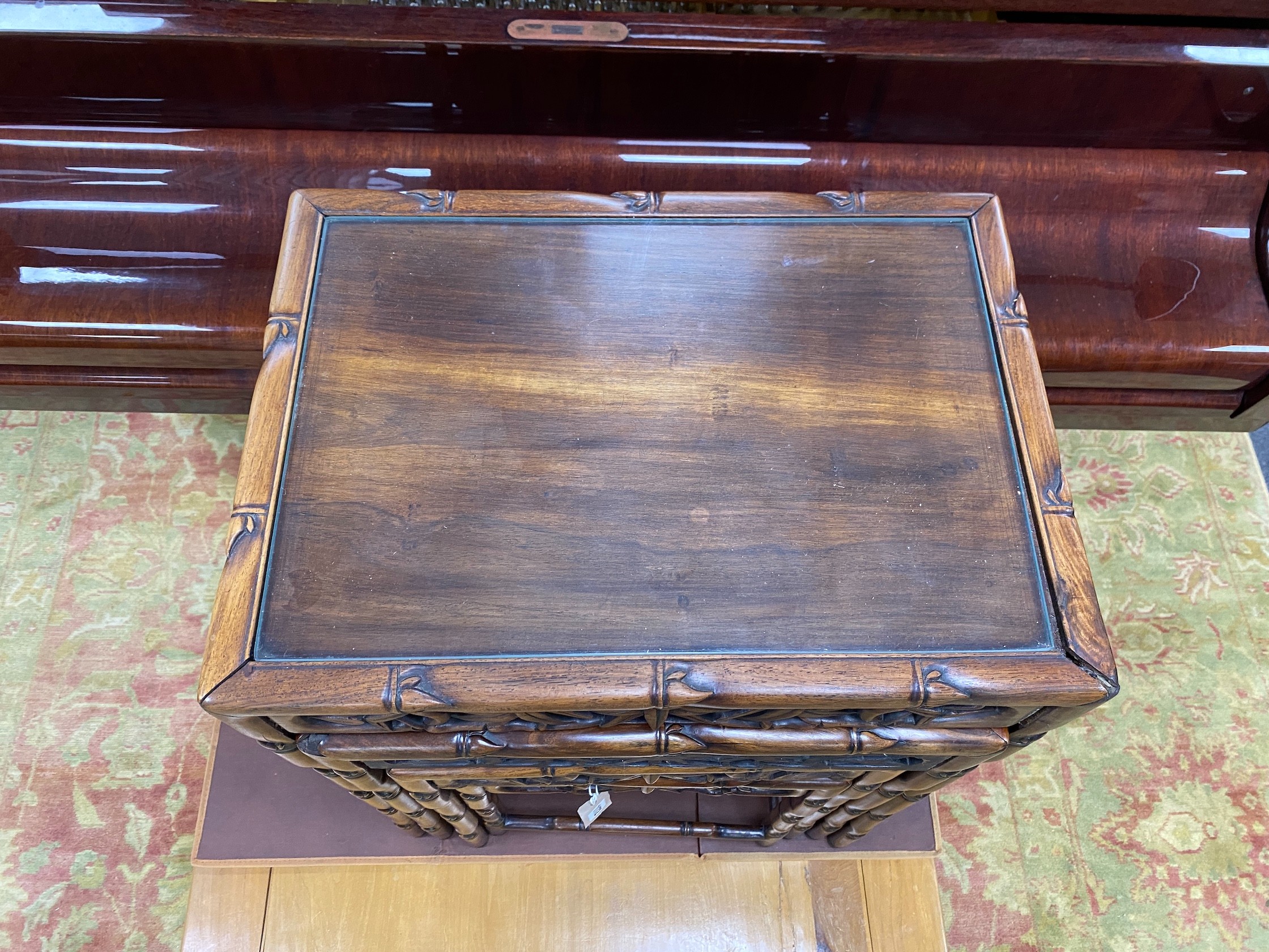 A quartetto nest of four Chinese rectangular hongmu tea tables, width 51cm, depth 36cm, height 72cm